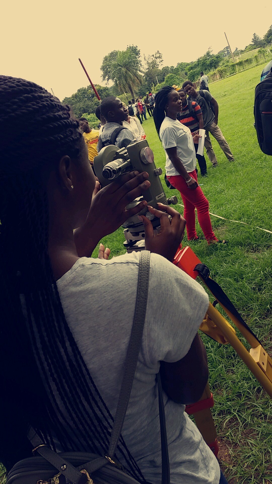 KNUST civil engineering students carrying out a field survey in Ghana